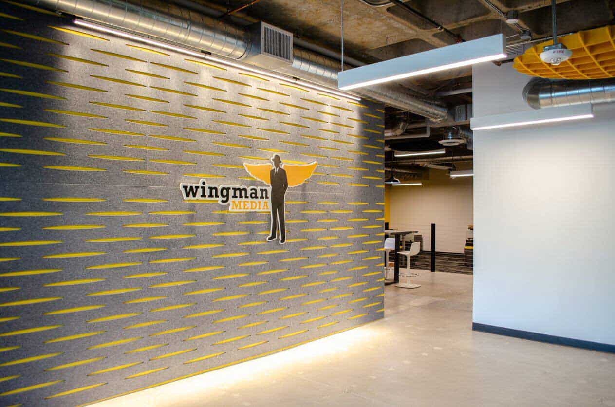 Renovated Office for Individual Tenants with Wingman Media Logo on Wall