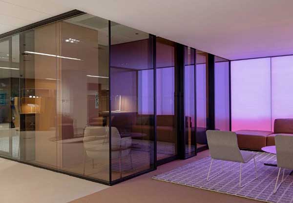 Colorful glass-walled office design by Pacific Office Interiors in Los Angeles
