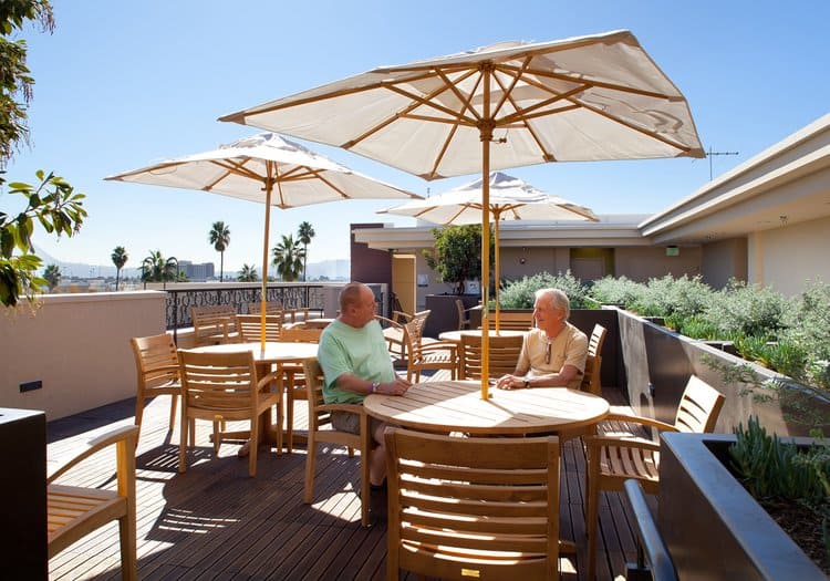 NoHo residents enjoying the rooftop furniture