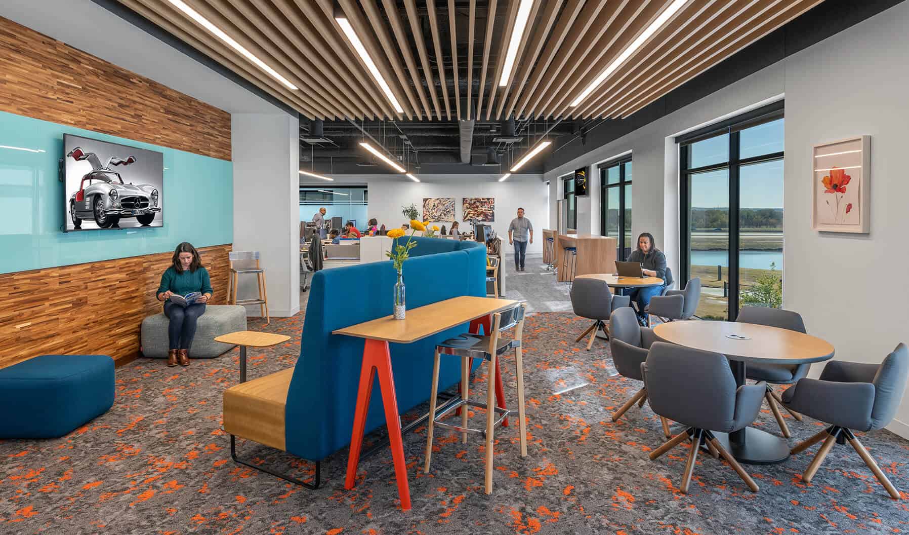 Mercedes employee lounge uses bright, varied colors and a mix of Haworth furniture