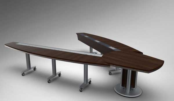 V-shaped Eventi Conference Table from Nevers provides equal visibility of all onsite team members to remote video conferencing participants.
