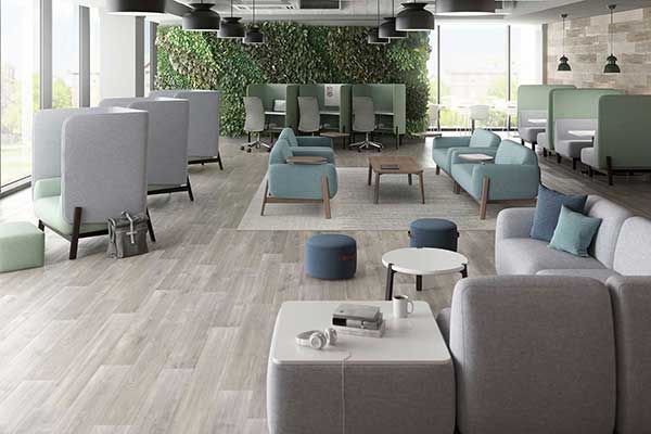 JSI Group CaaV Environmental series of oversized “wing” chairs creates individual “pods” within open office spaces.